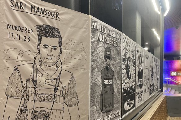 Forty portraits of killed Palestinian journalists were plastered to the walls outside the ABC Southbank offices in Melbourne on Wednesday.