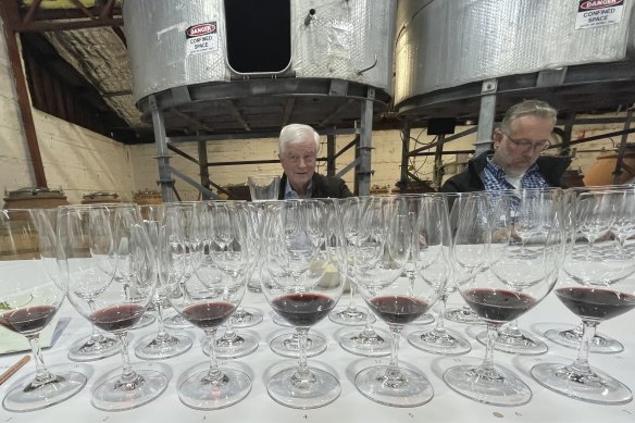 John Jens, centre, at Cullen’s 50th anniversary cabernet tasting, which included vintages as far back as 1978.