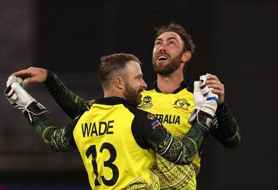 Matthew Wade and Glenn Maxwell celebrate a wicket.