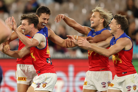 Brisbane’s Hugh McCluggage celebrates after scoring a goal against Melbourne at the MCG. 