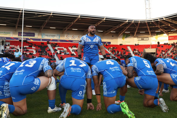 Junior Paulo addresses the Samoa side before the clash with Greece in Doncaster.
