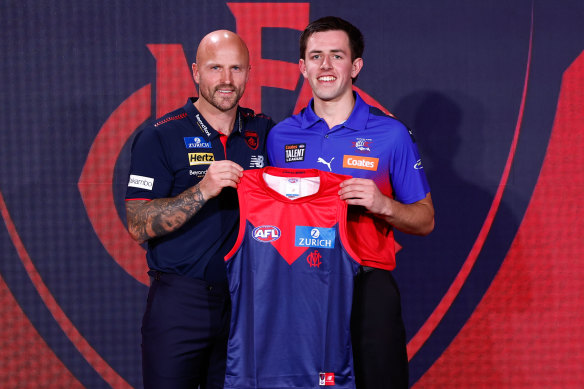 Former Melbourne star Nathan Jones presented Xavier Lindsay with his jumper after he was selected at pick No.11.