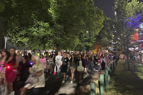 Fans stream out of MCG after Taylor Swift’s first Melbourne Eras show.