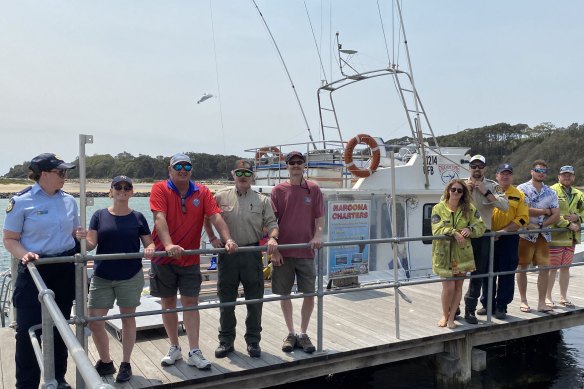 Narooma Charters owner Norm Ingersole (third from left) took international firefighters and inter-agency officers for a tour of Montague Island to thank them for their efforts. 