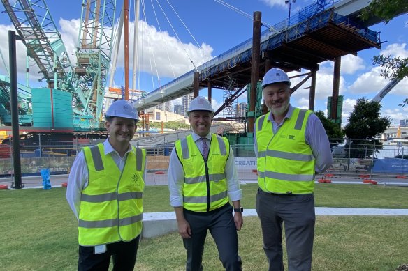 Star’s chief operating officer, Kelvin Dodt, Deputy Premier Steven Miles, and Queens Wharf Brisbane project director Simon Crooks celebrate the Neville Bonner Bridge spanning the Brisbane River.