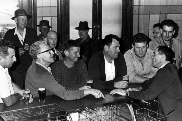 An Australian pub in the ’60s – where the only line is along the bar.