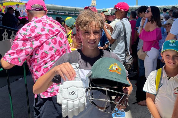 The lucky youngster who was gifted David Warner’s helmet.