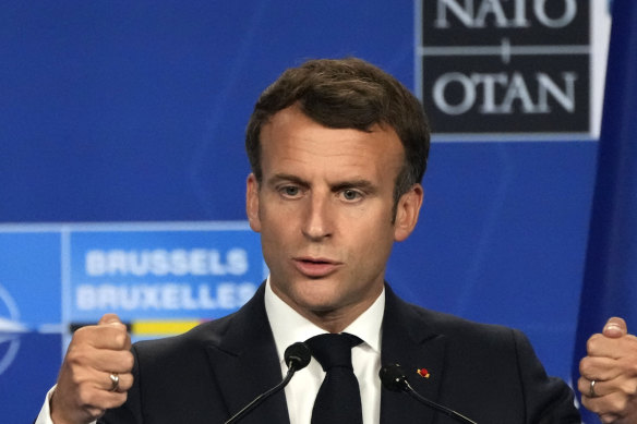 French President Emmanuel Macron speaks at the end of a NATO summit in Brussels.