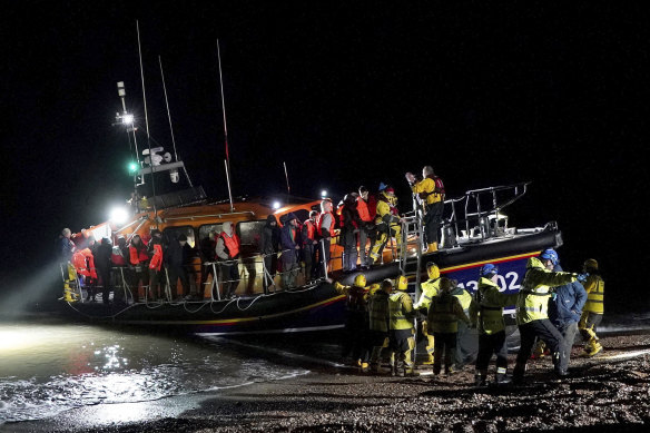 A group of people thought to be migrants are brought in to Dungeness, in Kent, England, late last month.