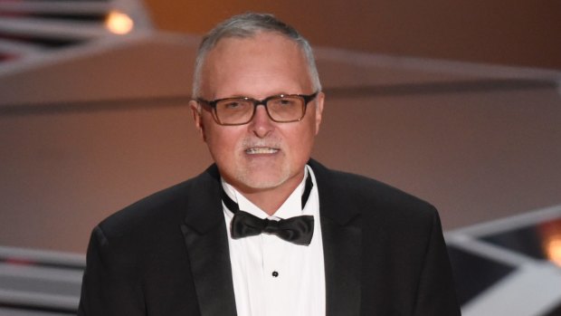 Lee Smith accepts the Oscar for best film editing for <i>Dunkirk</i>.