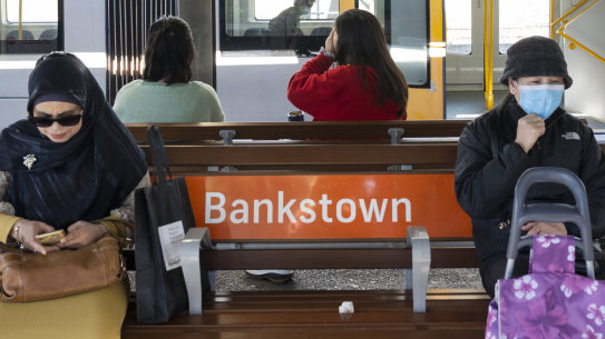 The T3 line is crowded with casual workers, tradies, parents with small children and school students 