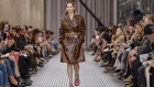 Hilary Swank wears a Miu Miu outfit at the Paris fashion show in October.
