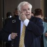 Clive Palmer a no-show in court as lawyers confirm he has COVID-19