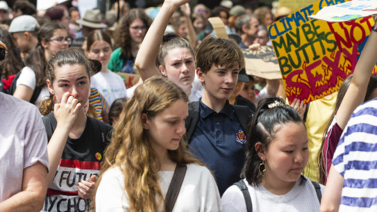Canberra school students strike from school to protest Adani's coal mine and government inaction on climate change .
