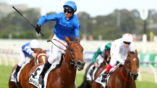 Glen Boss steers Bivouac to victory in the Newmarket Handicap at Flemington on Saturday.