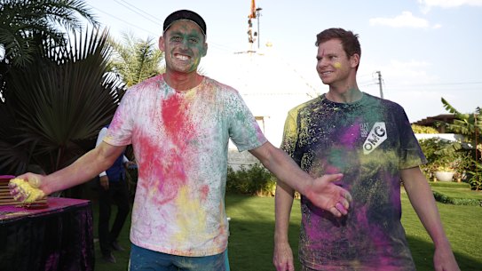Marnus Labuschagne and Steve Smith participate in a traditional Holi celebration in Ahmedabad this year.