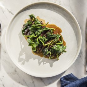 Scotch fillet with spinach and warrigal greens.