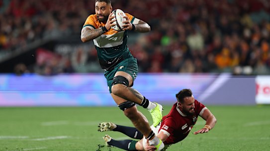 ADELAIDE, AUSTRALIA - JULY 12: Lukhan Salakaia-Loto of the AUNZ XV breaks from a tackle during the tour match between AUNZ XI and British & Irish Lions at Adelaide Oval on July 12, 2025 in Adelaide, Australia. (Photo by Cameron Spencer/Getty Images)