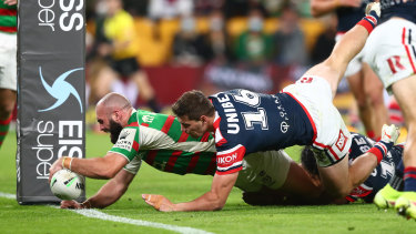 Mark Nicholls scores one of his two tries for South Sydney.