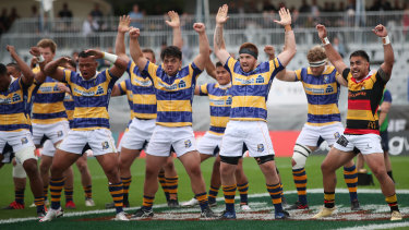 Mourning: Scott-Young, in the back row, takes part in a Bay of Plenty haka to honour Sean Wainui.