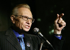 Larry King speaks to guests at a 2007 CNN party celebrating his 50 years of broadcasting. 