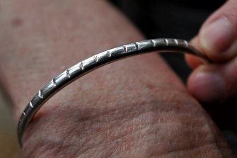 A bangle passed down to Tessa Newton from her mother. Each notch on the bangle represents a day in a life raft after her ship was torpedoed in World War Two.