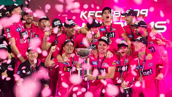The Sydney Sixers celebrate winning last summer's BBL.