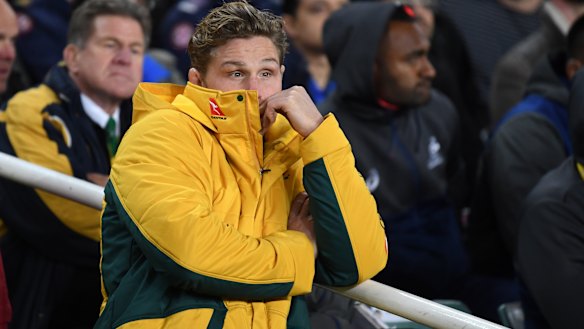 Not a great spectator: Michael Hooper looks on after injuring his hamstring in the series decider against Ireland. 