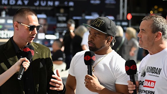 Tim Tszyu being interviewed by Shawn Porter and Jeff Fenech on the Gold Coast on Friday.