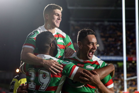 Laughing: John Sutton shows his delight as South Sydney roll the Warriors.
