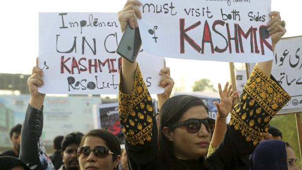 Pakistani civil society activists rally to express solidarity with Indian Kashmiris in Lahore, Pakistan.