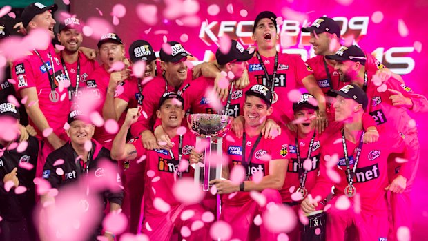 The Sydney Sixers celebrate winning last summer's BBL.