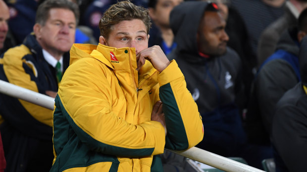 Not a great spectator: Michael Hooper looks on after injuring his hamstring in the series decider against Ireland. 