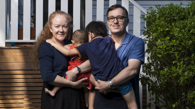 Sydney parents Fiona and Charles with their two adoptive children who have just come out of coronavirus quarantine. 