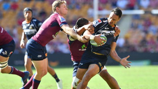 Brumbies winger Lausii Taliauli in action against the Queensland Reds. 