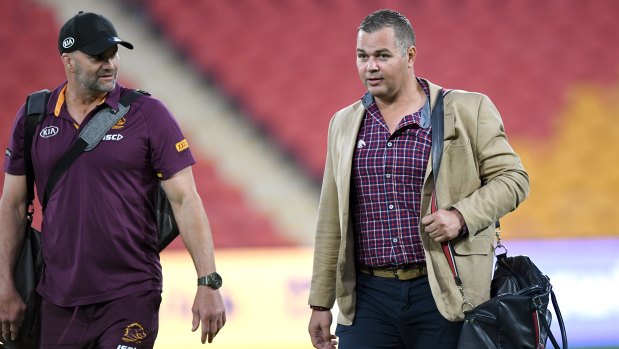 Anthony Seibold (right) has endured a disastrous time at the Broncos.