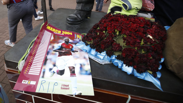 Tribute: A program from 2004 left  outside Villa Park before their play-off semi-final on Tuesday night.