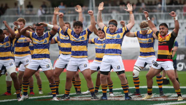 Mourning: Scott-Young, in the back row, takes part in a Bay of Plenty haka to honour Sean Wainui.