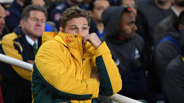 Dejected: Hooper was injured in the 15th minute of the Wallabies decider in Sydney. 