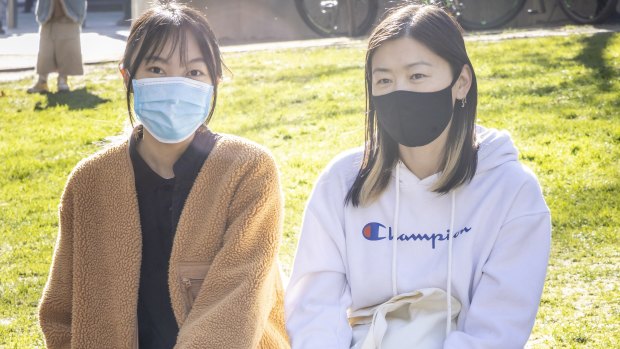 Snow Yue (left) and Grace Cheng wear masks when out, but don’t think mandates should be re-introduced. 