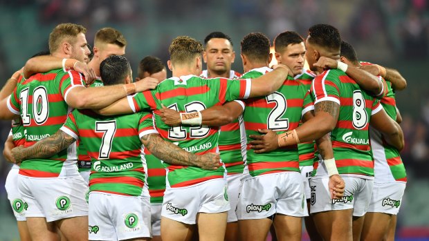 Solidarity:  Souths and Roosters players observed a minute's silence at the SCG on Friday night.
