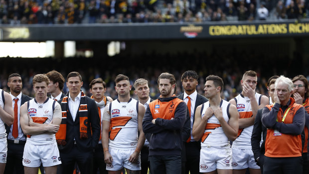 Giants players and officials come to terms with their AFL grand final defeat.