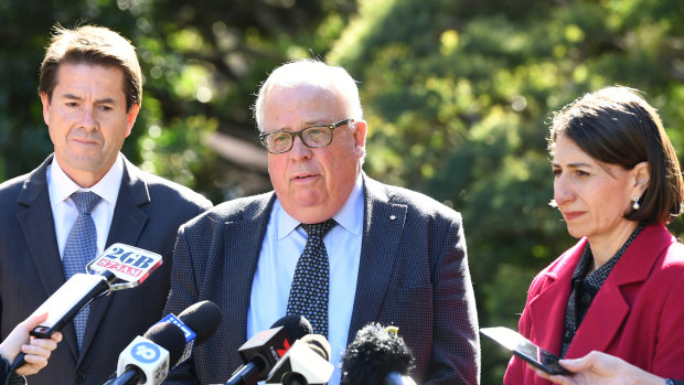 NSW Building Commissioner David Chandler (centre) with Premier Gladys Berejiklian and Better Regulation Minister Kevin Anderson at NSW Parliament House.