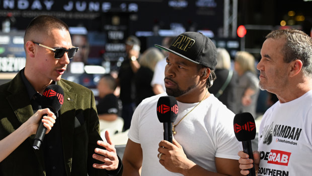 Tim Tszyu being interviewed by Shawn Porter and Jeff Fenech on the Gold Coast on Friday.