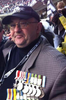 Neville Donohue with some of his medals.