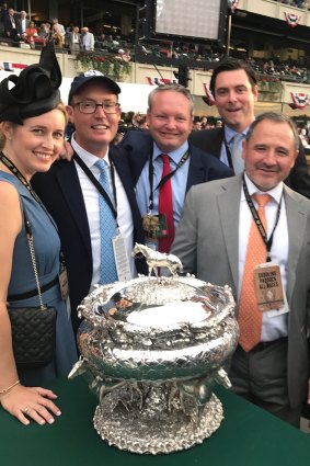 Justifiably proud: SF Bloodstock team Katie Ryan, Tom Ryan, Henry Field, Mick Flanagan and Gavin Murphy with the Belmont Stakes trophy.