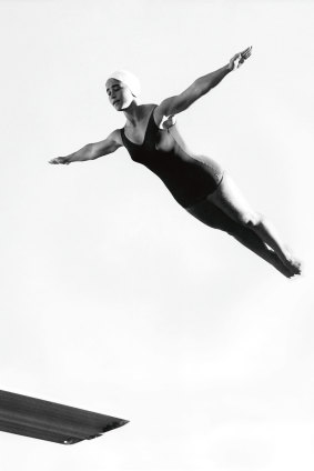 Sue Knight competes in the preliminaries of the Women's springboard event on November 28, 1962.