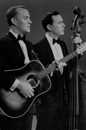 The Smother Brothers perform their unique blend of comedy and folk singing as guest stars in a telecast of the Andy Williams Show. May 25, 1967.