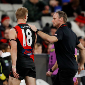 Bombers coach Ben Rutten and Michael Hurley.