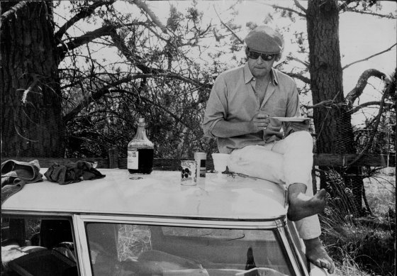 Frank Moorhouse having lunch on the go in 1972.